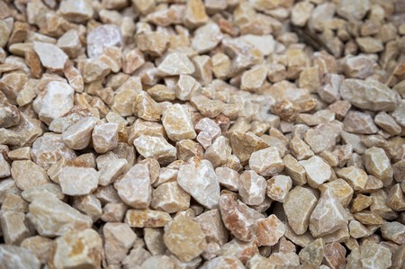Our 22mm apricot decorative stones have an attractive peach, cream colour which deepens when wet. These stones are ideal for driveways, rockeries, borders. Apricot stones are also fish friendly which makes it ideal for water features, ponds. Stones come in a mixture of both angular and rounded pieces so it is suitable for driveways, for pathways, decorative use.  